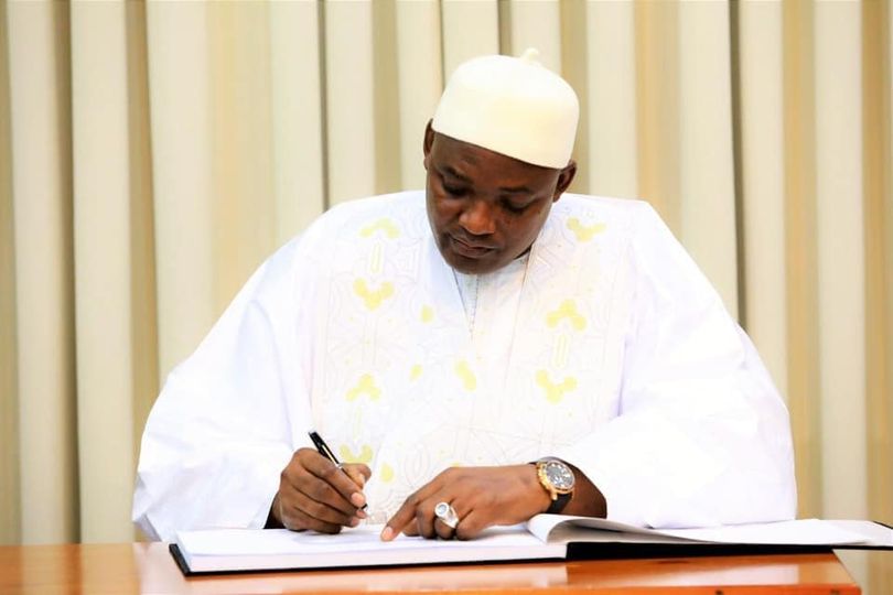 president Barrow signing
