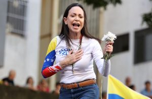 Trump’s Coveted Nobel Prize Goes to Machado as His Administration Deports Venezuelans Fleeing Maduro
