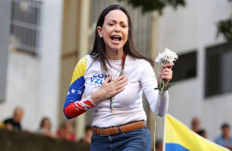 Trump’s Coveted Nobel Prize Goes to Machado as His Administration Deports Venezuelans Fleeing Maduro