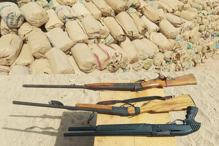Bundles of Cannabis and rifles seized during the operation